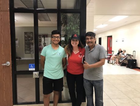 Student and dad help 30 families at shelter