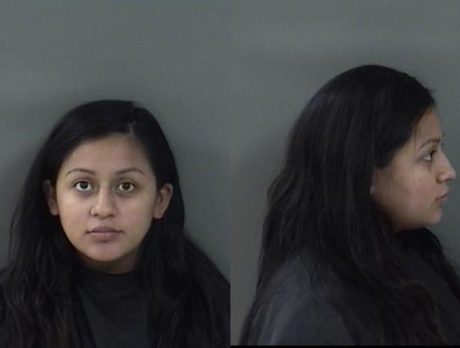 Woman accused of chasing neighbors with machete