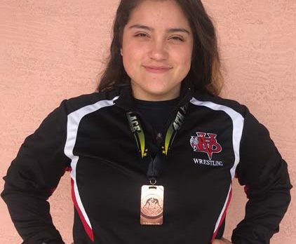 Vero High School wrestler Toscano proves her mettle