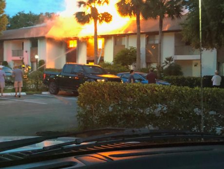 ‘Holding my son, I watched the flames in disbelief’