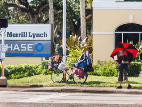 Island panhandler takes midday break to ‘grab a cold beer’