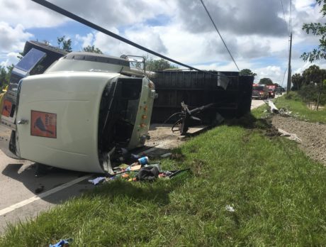 Man hurt after dump truck tips over in north county