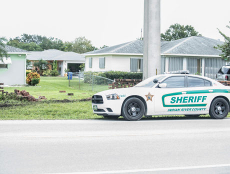 Vehicle crashes through fence off 27th Ave.