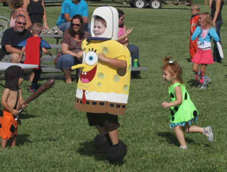 Costumed creatures, characters swarm Riverside Park for parade