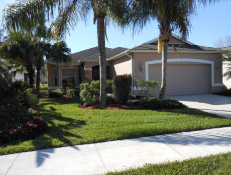 Home offers low maintenance in secure neighborhood