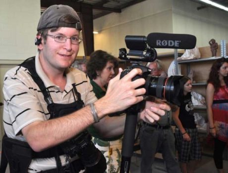 CAMERA: Is he DEA, ICE, FBI? No, just a photographer.