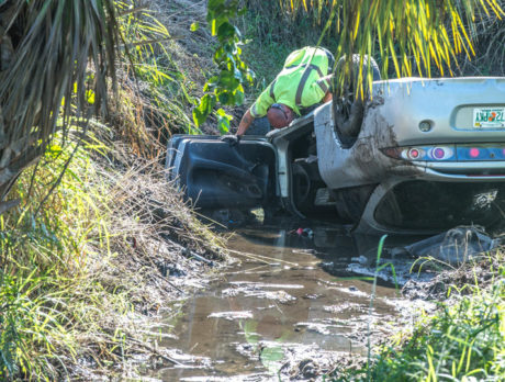 Car in canal off 66th Ave. south of College Ln.