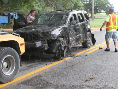1 dead after car crashes in canal off 12th Street