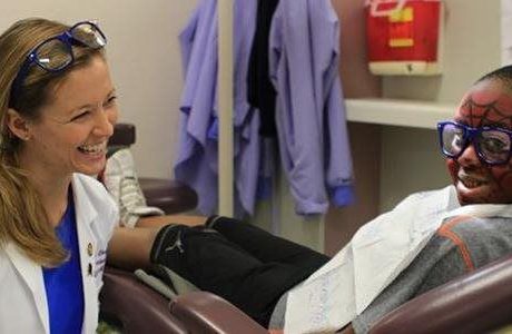Volunteers bring healthier smiles to kids in need