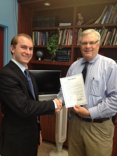Smith administers oath to Patrick McDonald