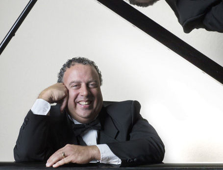 Music director returns from sabbatical – on a motorbike
