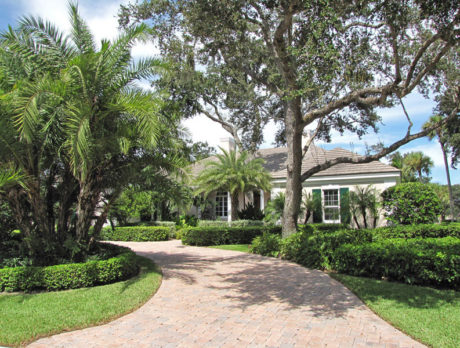 Georgian-style home offers lake and golf course views