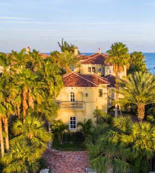 Masterpiece overlooks ocean in charming beachside village