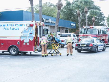 Parked car collides with Perkins Pharmacy building