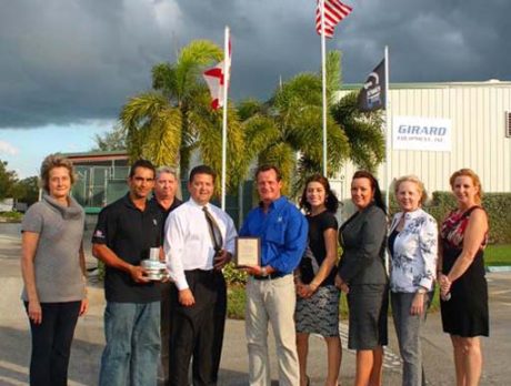 Girard Equipment accepts “Proudly We Hail” Award