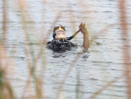 Dive team searches for stolen handgun