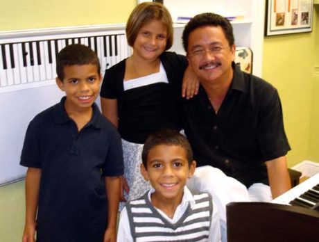 Keyboard lessons given to Youth Guidance kids