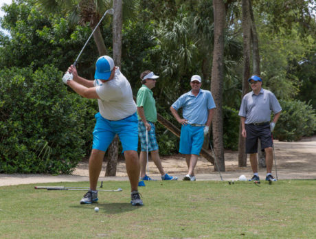 PHOTOS: What drive! 4 raise $4K in 72-hole golf odyssey