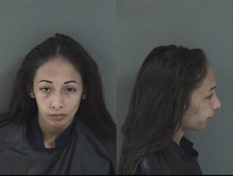 Woman charged after driving car into bedroom of home
