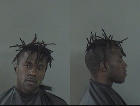 Motorist hit in head with rock; man charged