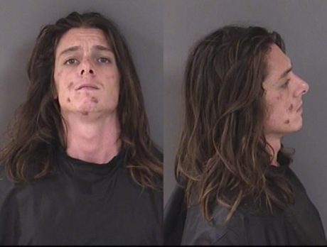 Man accused of beating woman, attacking officer