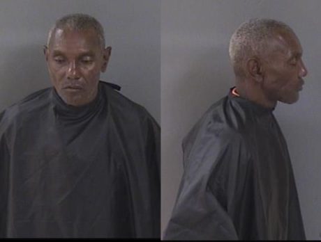 Man charged after beating at bus stop