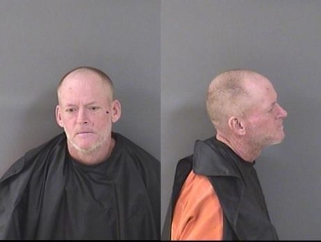 Police: Man found choking unconscious woman behind dumpster