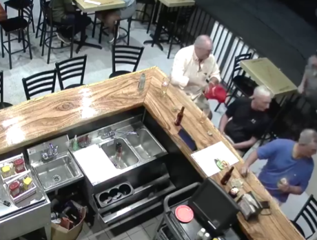 Video footage shows man spitting on patron wearing ‘MAGA’ hat
