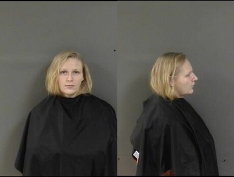 Charged – Woman accused of writing fake check leaves behind fingerprint