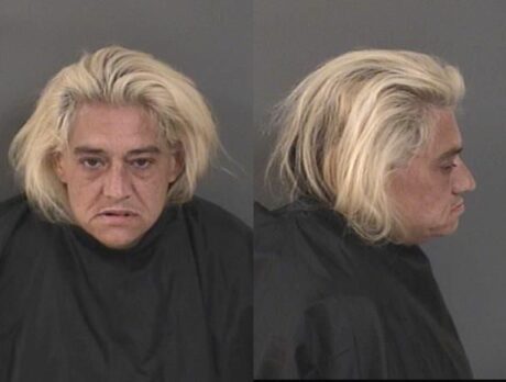 Deputies: Woman runs after crashing car into bicyclist and in ditch