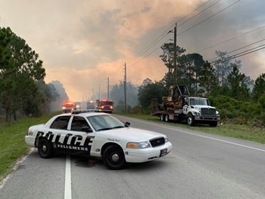 Brush fire fully contained; C.R. 512 reopen