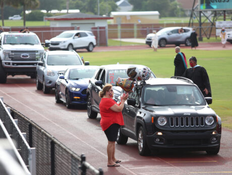 Photos – Traditional, drive-thru high school graduations