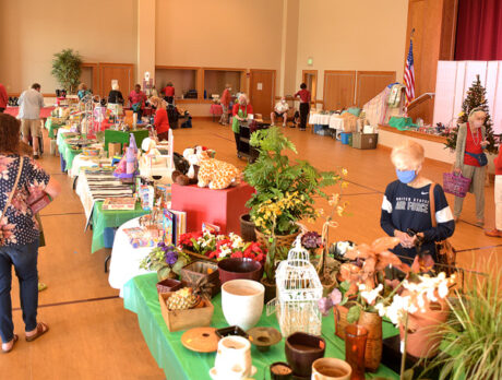 Cheery hellos and good buys at ‘Christmas Tree Lane’