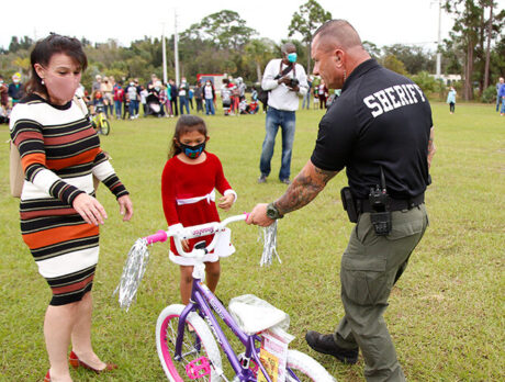Ride on! Kids rejoice in ‘Christmas Bike Giveaway’