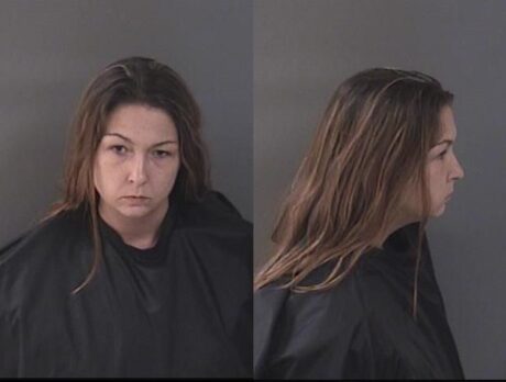 Woman charged after attacking disabled father, sister, officers