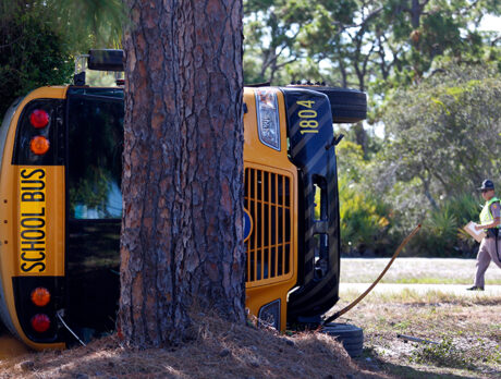 4 hurt after school bus flips in crash with tractor-trailer in Sebastian