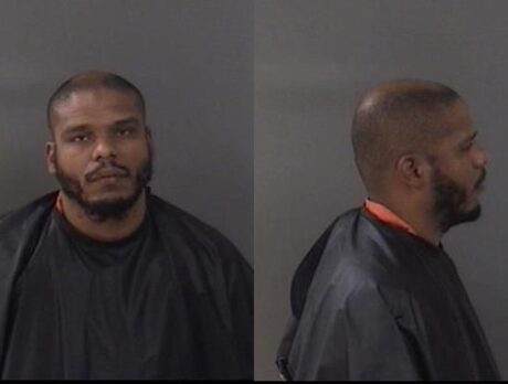 Former employee charged in shooting at bar parking lot