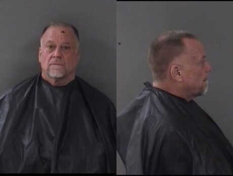 Man charged after beating, stabbing woman