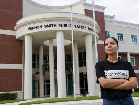 Island house cleaner hopes to trade bucket for badge