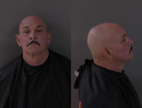 Man charged with impersonating officer