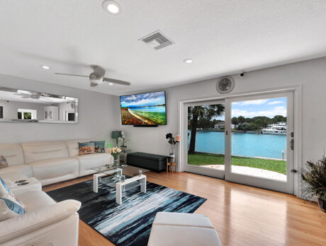 Waterfront pool home with dock offered in Bethel by the Sea