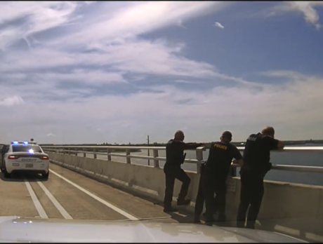 Police save man from jumping from Alma Lee Loy Bridge