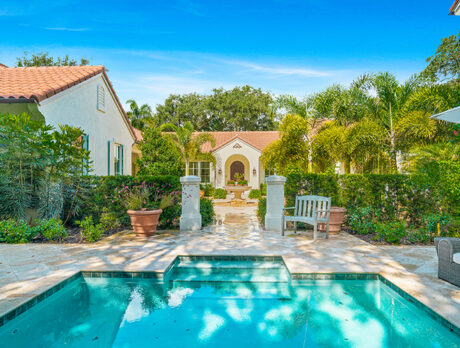 Mission Revival-style home features old-world courtyard